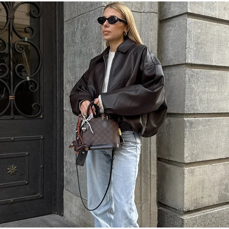 Veste Femme Cuir Court à Col Montant – Zippée & Ceinturée – Automne 2025 - Vestico