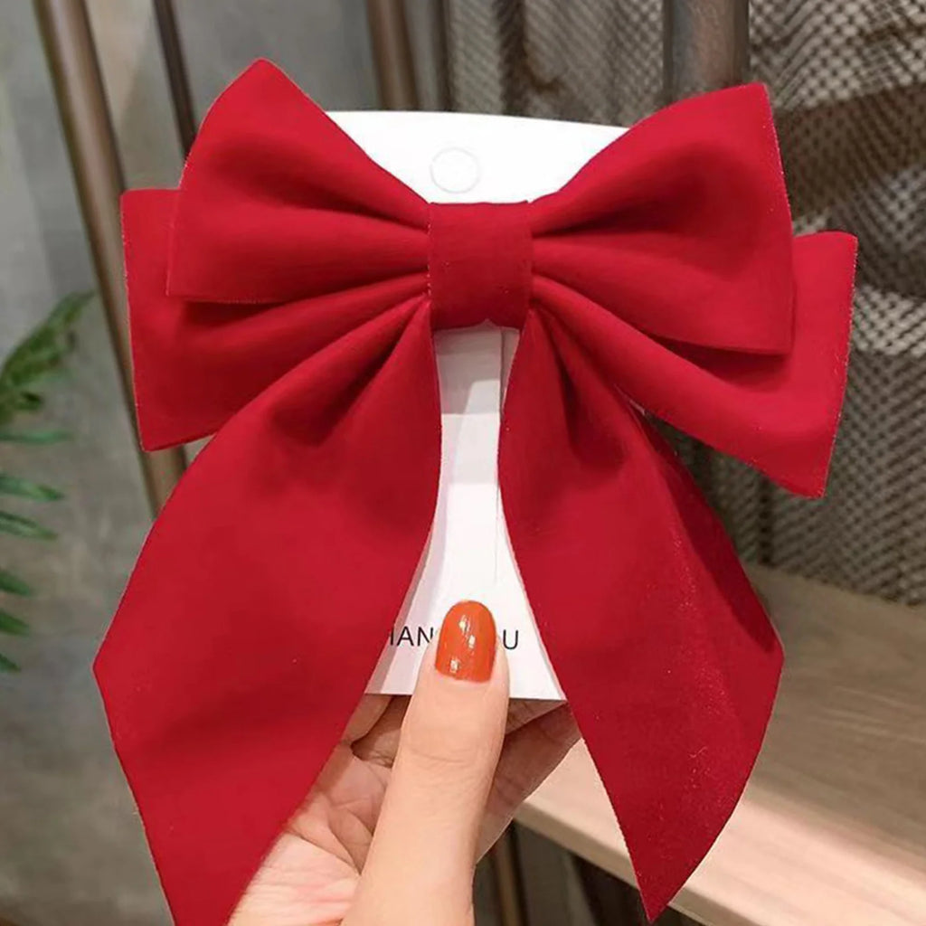 Barrette Femme avec Nœud Rouge – Élégante & Festive